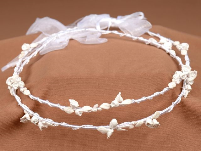 $175

Stefana with pretty clusters of white flowers and leaves wrapped with a thin sparkly translucent cord. 

CP314-175