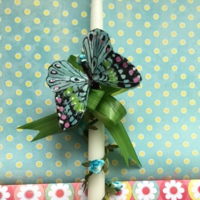 Garland wrap, green leaf pull bow, and fantastic butterfly. 

All Easter candles $20.00 plus special handling and shipping of $12.95.