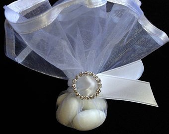 White organza with satin trim.  Rhinestone buckle.  5 Koufeta.  $3.75 each. Can handle any size order. 