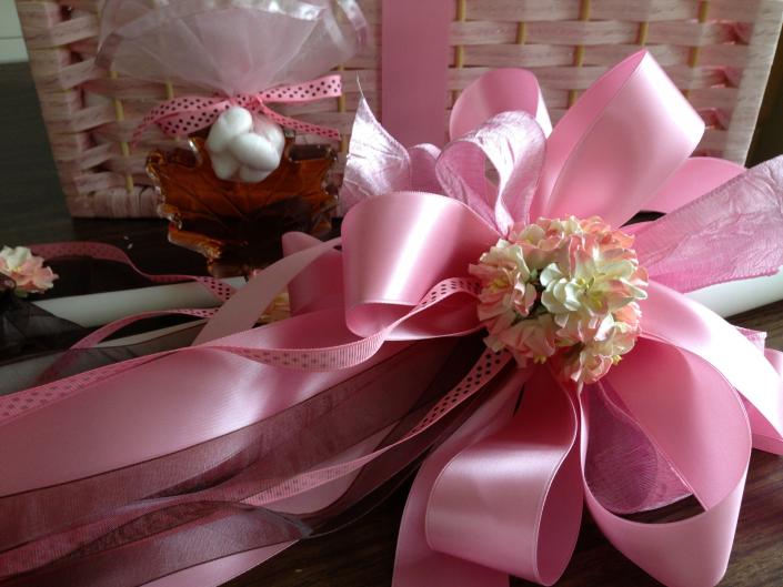 Pink Satin, Pink Shear, Pink and Brown Grosgrain ribbons. Two tone paper flowers.  

32 inches: $95

Coordinate with small syrup bottles shaped like a maple leaf, koufeta, and coordinating ribbon.  