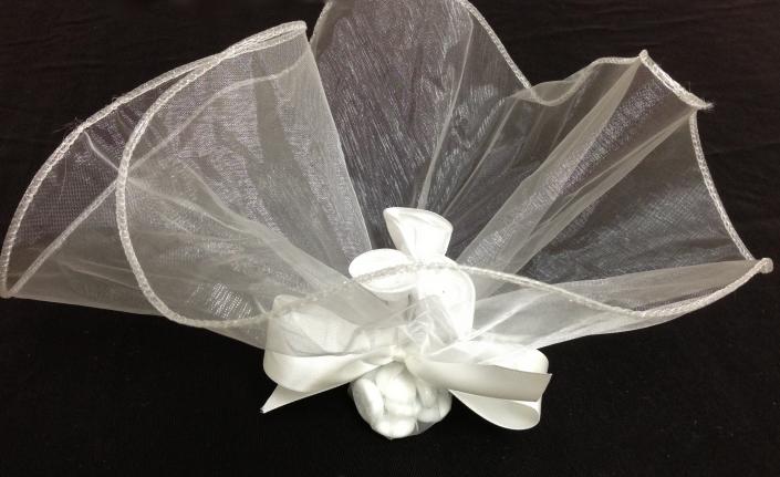Flowers imbedded in the toule helps make the party favor a real crowd pleaser