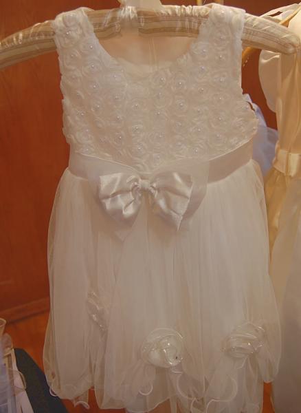 Many times the family waits a bit to baptize their baby girl.  We carry size 3T one of a kind dresses. 

This one is $75.  