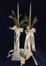 Organic and very Greek.  24 inch wedding candles with satin ribbon and natural olive branches.  Matching party favors or boubounieres made with 7 almonds and organza from Greece.  

Candle set:  $90.00
Party favors: $5.00 each.  Contact us to order.  