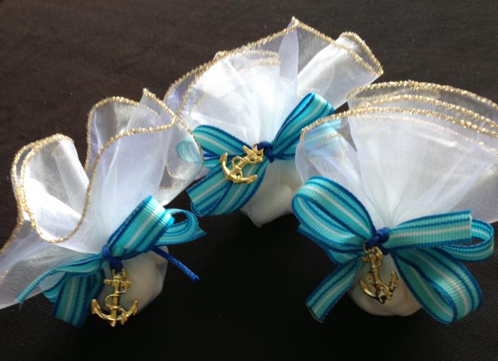 This greek mom called us to help accessorize her baby's boy's baptism.  Gold accented anchor on a royal blue cord with gold trimmed organza matched royal blue matyrika.  Perfect for a sailor themed celebration.  