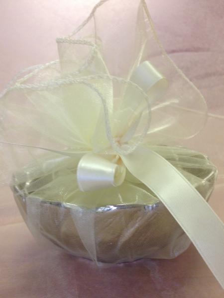 Our bride wanted a practical gift to give to each wedding guest.  This bowl is 5 inches in diameter and is food safe.  Guests can use as candy dish or nut bowls to entertain in the future.  5 white jordan almonds, 18 inch ivory organza and bridal white ribbon.  A beautiful presentation.  $18 each.  Can be made in pure white. 