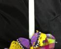 Butterflies and felt ribbon accent silk in various colors. 