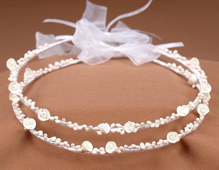 $150.  White roses with beads (no crystals) stefana.



CP316-150