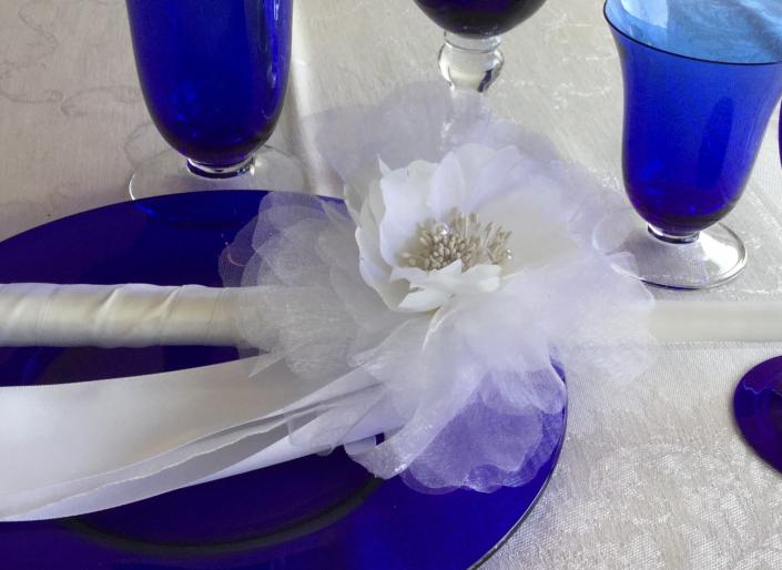 Can be done in white or ivory. This candle is perfect for the Bride and Groom.  24 inches long with white or ivory satin ribbon.  Easy to manage during the church service. 

$95 for the set plus shipping.  $24.95