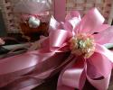 Pink Satin, Pink Shear, Pink and Brown Grosgrain ribbons. Two tone paper flowers.  

32 inches: $95

Coordinate with small syrup bottles shaped like a maple leaf, koufeta, and coordinating ribbon.  