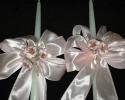 18 inch Candles decorated to match the large baptismal candle.  Pink silk with dried roses.  