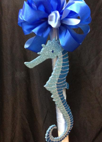 30 inch white candle with a seahorse that will make your guests smile.  Works with any theme.  $95