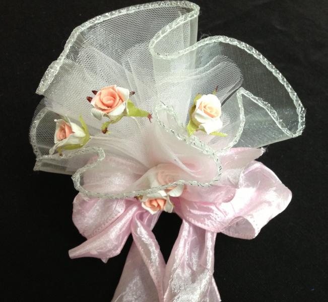 This party favor can go for a wedding or a baptism.  The bow is a standout that makes it pop. 